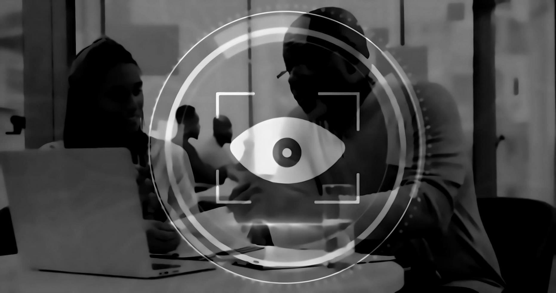 Students working together on blockchain concepts with laptops and documentation